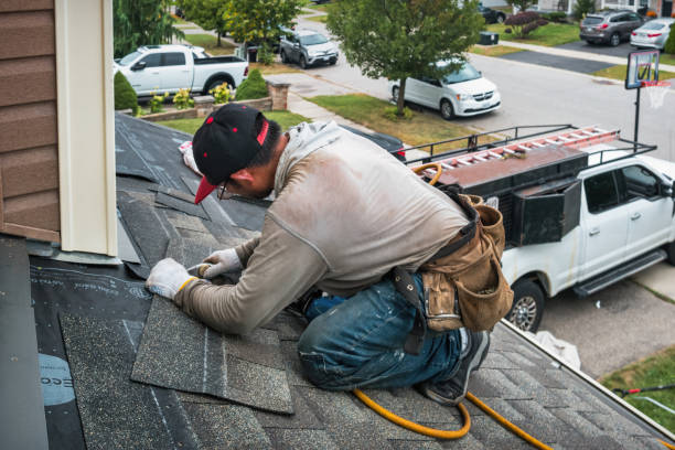 Professional Roofing technician working in Purdys, NY